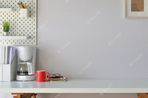 Photo of working desk in modern work place.equipment on table. morning workspace concept.