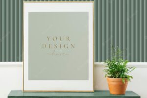 Picture frame mockup on a green wooden cabinet