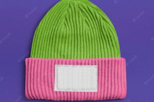 Pink and green beanie with blank white fabric label winter accessories