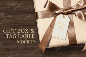 Present greeting tag mockup psd on a gift box with be happy and smile text