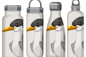 Set of different white thermos bottles with bird pattern
