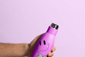Thermo bottle mockup held in hand
