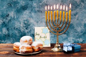 Traditional hanukkah sweets with candles