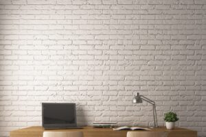 White bricks wall with modern working desk