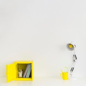 White minimalistic workspace with yellow details
