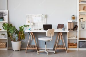 Background image of cozy home office workplace in white decorated by plants copy space
