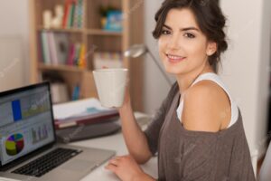Beautiful woman has break from working at home