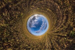 Blue little planet inversion of tiny planet transformation of spherical panorama 360 degrees spherical abstract aerial view curvature of space