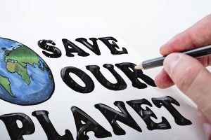 Close up of man hand drawing save the planet sketch on white background earth day concept