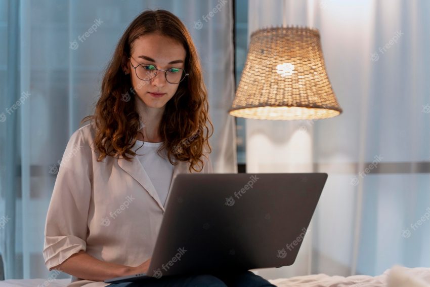 Close up on person working at home at night