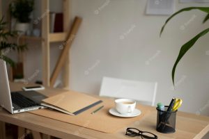 Desk arrangement with laptop high angle