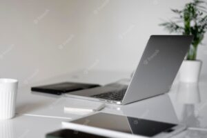 Desk arrangement with laptop