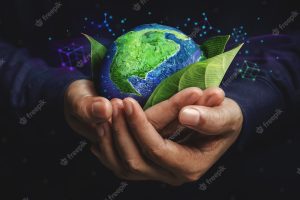 Esg concept. nature meet technology. green energy, renewable and sustainable resources. environmental and ecology care. hand embracing green leaf and globe
