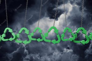 Green recycling symbol hanging from a chain against dark clouds d rendering
