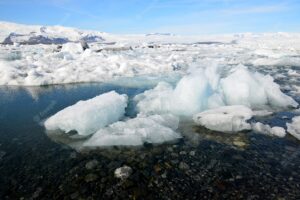 Large ice chunks in a shallow lagoon in iceland