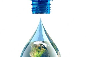 The last drop getting out of a glass bottle,environmental protection concept, global warming.