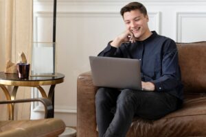 Man using a laptop and working from home