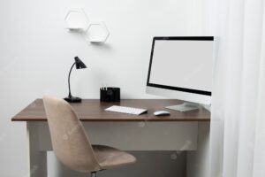 Minimalist desk arrangement with lamp