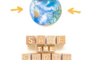 Save the earth inscription and planet on paper
