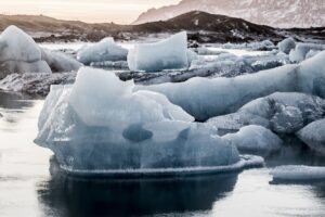 Vertical shot of several pieces of ice in the glacial lagoon jokulsarlon in iceland