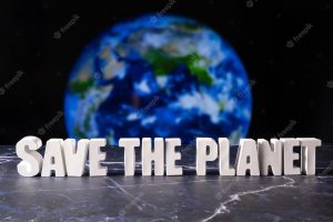 Word save the planet made from white concrete letters against the background of planet earth