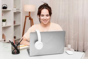 Front view of woman working at desk