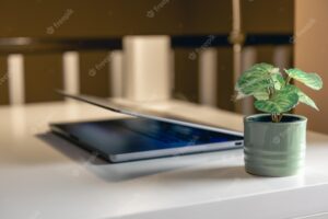 Laptop on the desktop on a blurred background