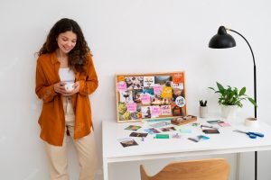 Medium shot woman creating inspiring vision board