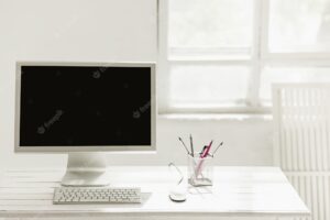 Stylish workspace with computer on home or studio