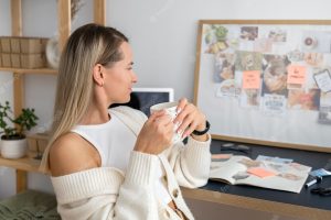 Woman making vision board side view