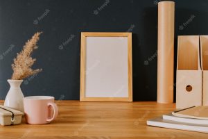 Your text here empty frame on wooden table